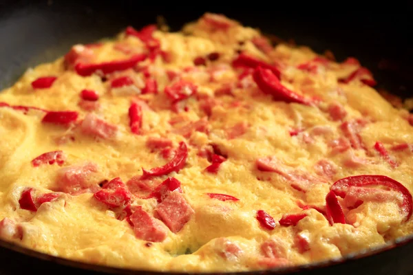 Cooking of omelet with red paprika — Stock Photo, Image