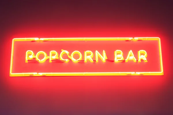 Płyta popcorn dokonanych od czerwone neony — Zdjęcie stockowe