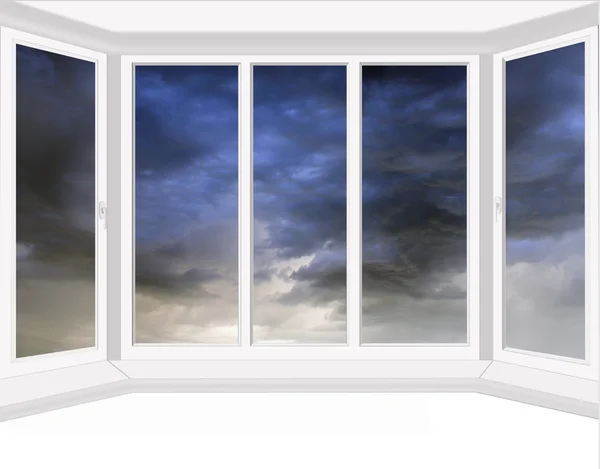 Windows with dark thunder clouds beyond it — Stock Photo, Image