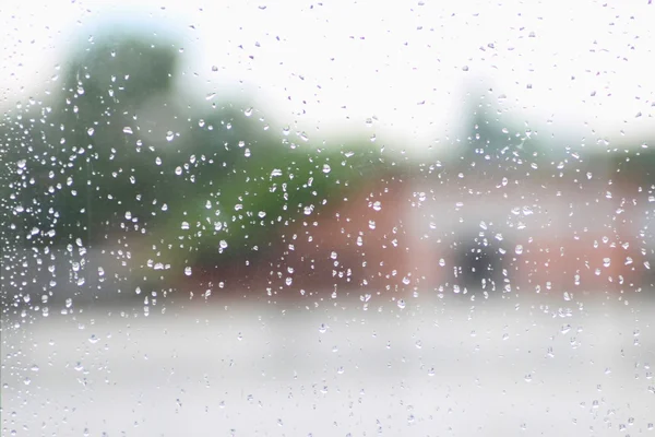 it's raining behind the window