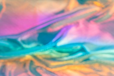 İnci mavisi tekstil arka planından çıkarılmış. Tatil ve parti afişi için soyut bir festival arkaplanı. Parlak arkaplan, neon desenli ve yanıp sönen ışıklar. Pastel inci renkleri