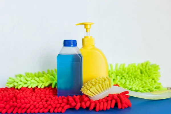 Housework, housekeeping and household concept,cleaning stuff on white background.bottle of detergent, rubber gloves with rag ,sponge.domestic cleaning sanitary supplies.Copy space — Stok fotoğraf