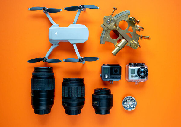 a selection of old a new technology used by adventurers to navigate and record their journeys 