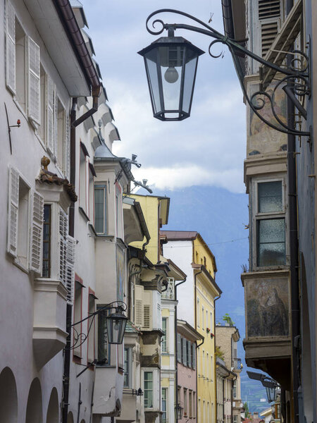 Historic city of Merano, Bolzano, Trentino Alto Adige, Italy. A street with arches
