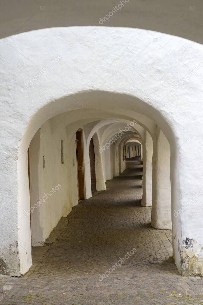 Glorenza, or Glurns, Bolzano, Trentino Alto Adige, Italy: historic city in the Venosta valley. White portico