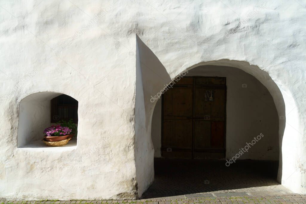 Glorenza, or Glurns, Bolzano, Trentino Alto Adige, Italy: historic city in the Venosta valley. White portico