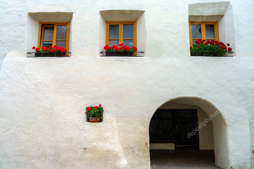Glorenza, or Glurns, Bolzano, Trentino Alto Adige, Italy: historic city in the Venosta valley. White portico
