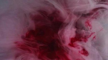 Mürekkebi karıştır. Duman suyu. Soyut ruhani sanat arka planında asılı duran kırmızı, kırmızı, dumanlı, dumanlı, kimyasal, nemli sis..