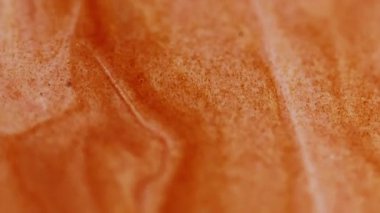 Mürekkebi karıştır. Akrilik pigment. Soyut sanat arkaplanındaki sıvı mermer yüzey kimyasal su dalgasında çözünmüş turuncu bronz renkli tahıl boyası.