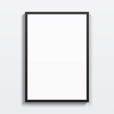 Beyaz bir duvarda asılı siyah dikey çerçeve.
