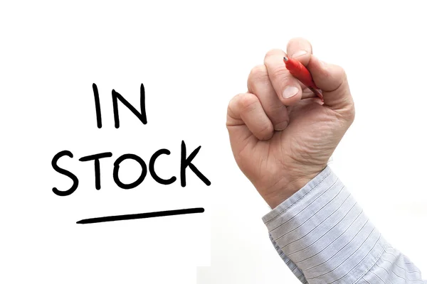 Hand Writing 'In Stock' — Stockfoto