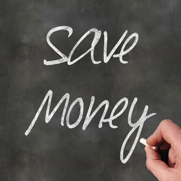 Hand schrijven geld besparen — Stockfoto
