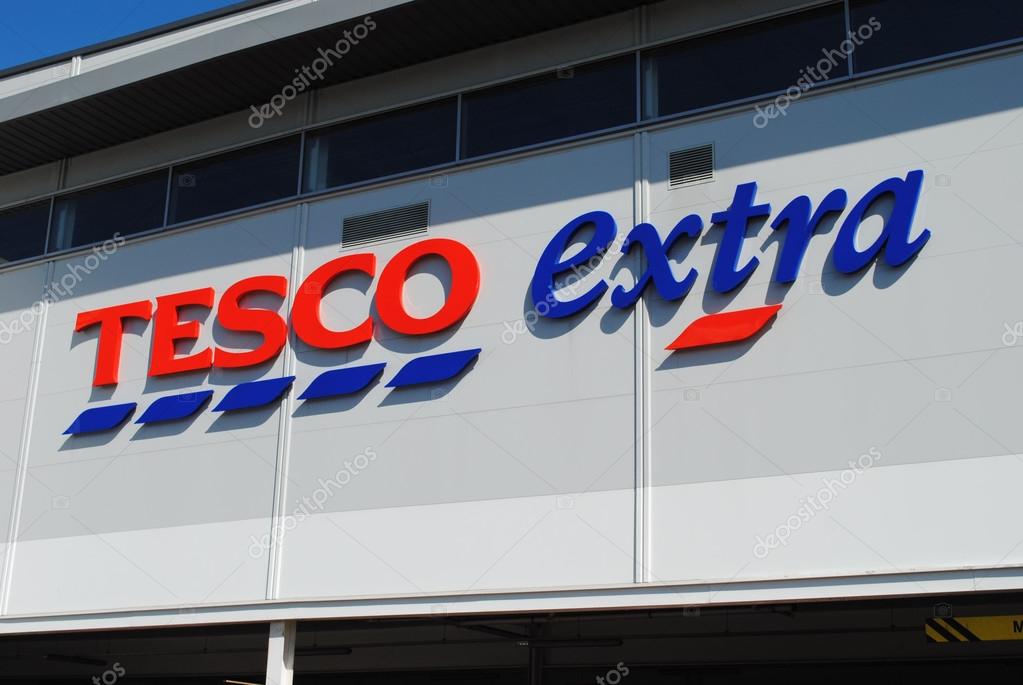 Dudley - Apr 26: View of a Tesco logo on the outside of a Extra store on Apr 26th, 2015 in Dudley, UK. Tesco has announced the closure of 43 stores in the UK after reporting massive financial losses.