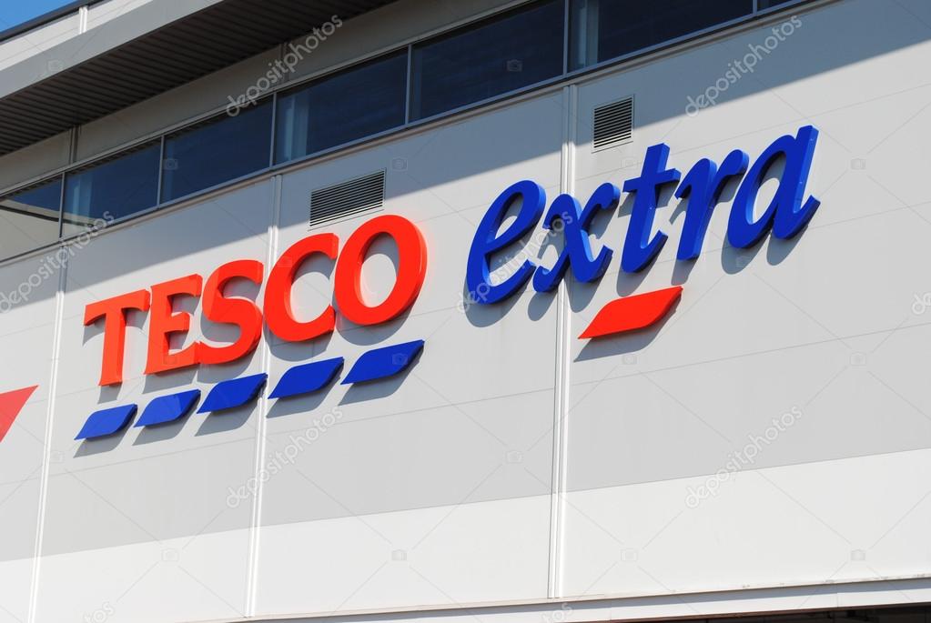 Dudley - Apr 26: View of a Tesco logo on the outside of a Extra store on Apr 26th, 2015 in Dudley, UK. Tesco has announced the closure of 43 stores in the UK after reporting massive financial losses.
