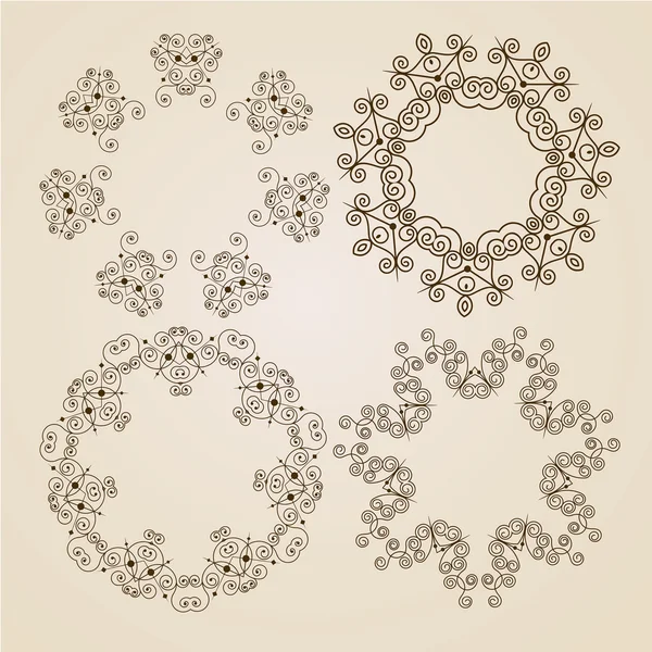 Rosetas ornamentales o copos de nieve — Vector de stock