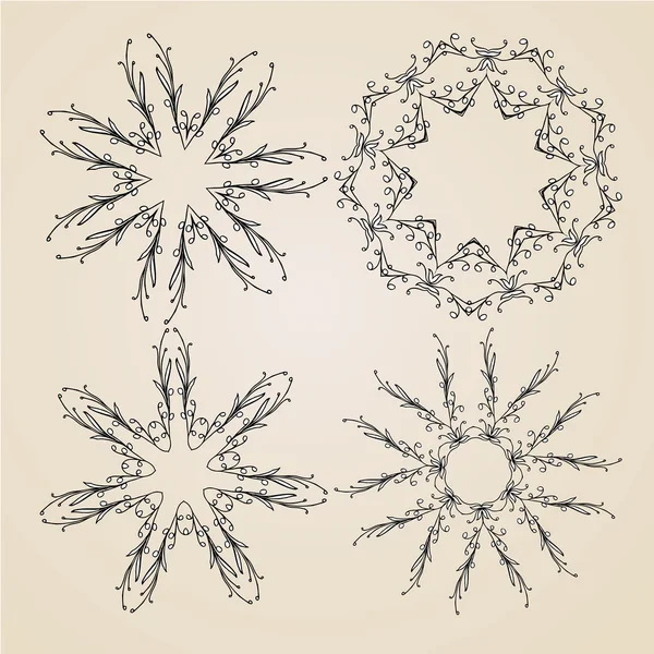Rosetas ornamentales o copos de nieve — Vector de stock