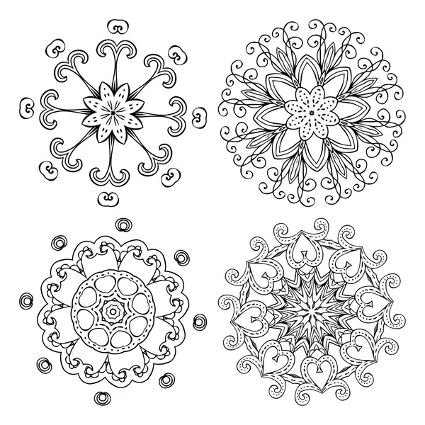 Rosetas ornamentais ou flocos de neve — Vetor de Stock