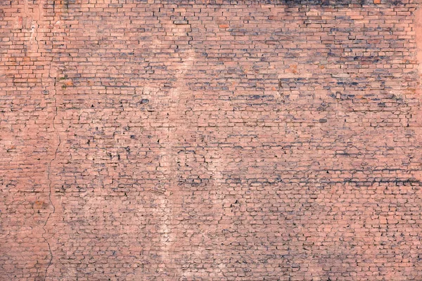 Hintergrund von der roten alten Backsteinmauer — Stockfoto