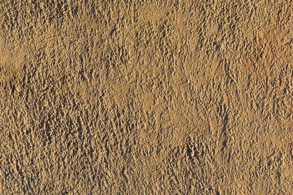 Hintergrund aus einer Betonmauer — Stockfoto