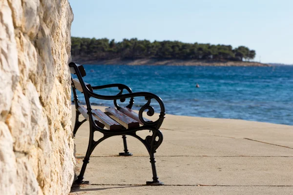 Wooden and iron bench — Stock Photo, Image