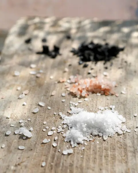 White Pink Black Salt Wooden Background — Stock Photo, Image