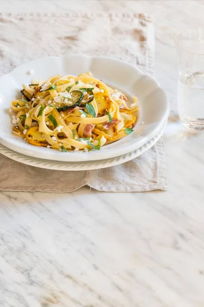 Fresh Homamade Tagliatelle Yellow Green Courgettes Bacon Goat Cheese — Stock Photo, Image