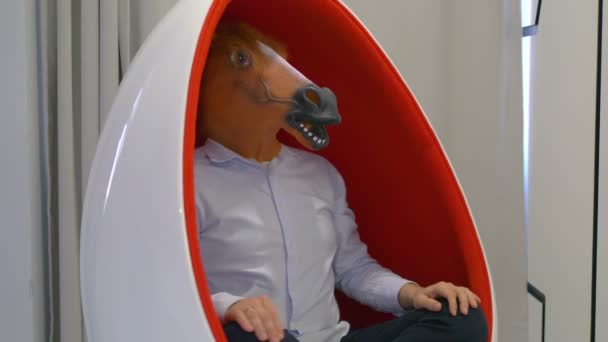 Man Horse Mask Sitting Lotus Position Slow Motion 60Fps — Stock Video