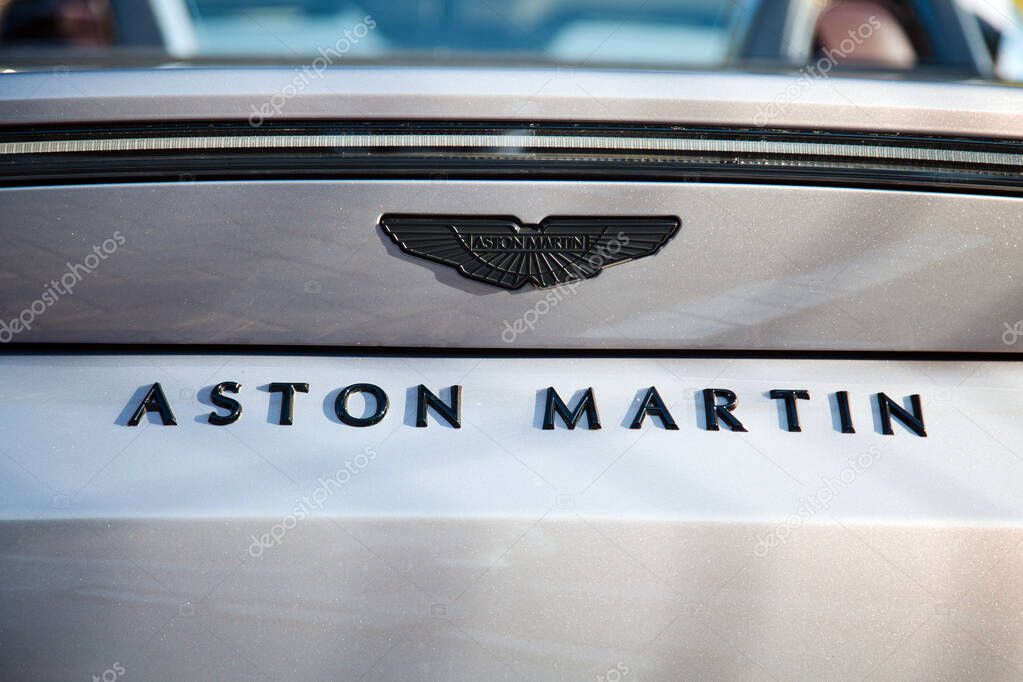 Vilnius, Lithuania - 2025-09-20 - Black matte Aston Martin logo and lettering on car trunk lid