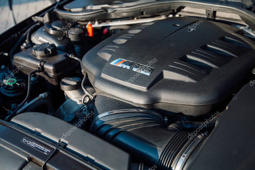 Vilnius, Lithuania - 2025-09-20 - BMW engine bay with M Performance V8 logo on engine cover
