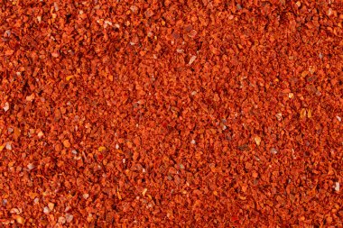 Kırmızı biberli, çekirdeksiz gevrek arka plan. Baharatlar ve yemek malzemeleri. Kore 'de Gochugaru olarak bilinir. Kimchi için kullanılır..