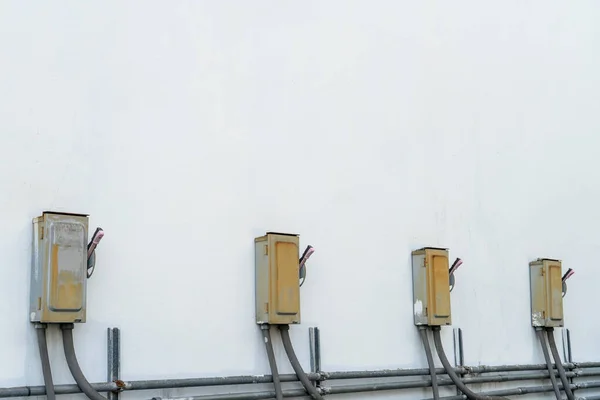 Electric control box and wall concrete and old and electrical power control box