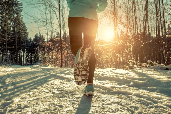 Woman Running at winter — Stock Photo, Image