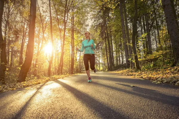 Runner in action outdoors — Stock Photo, Image