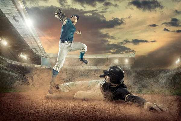 Jogadores de beisebol em ação Fotografias De Stock Royalty-Free