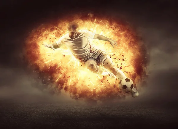 Football player in fire flame Royalty Free Stock Images