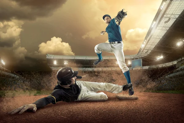 Baseball players in action — Stock Photo, Image