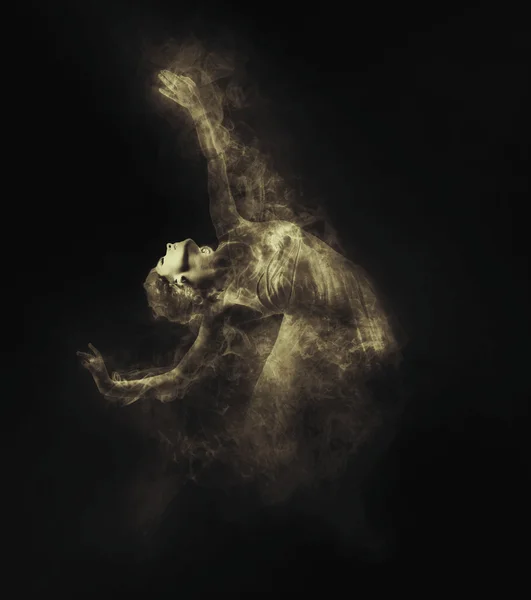Dancer from smoke on dark — Stock Photo, Image