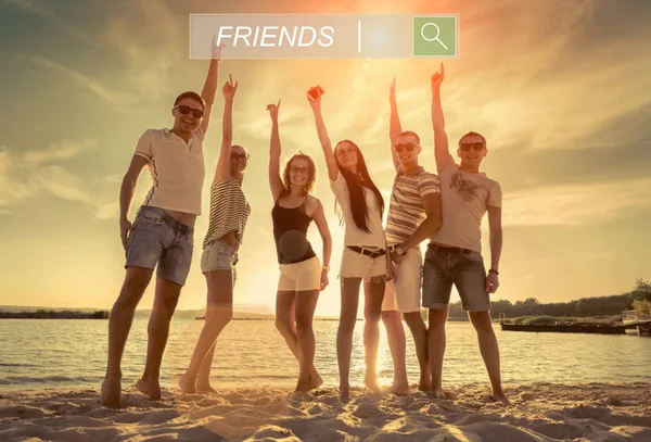 Friends funny dance on the beach — Stock Photo, Image