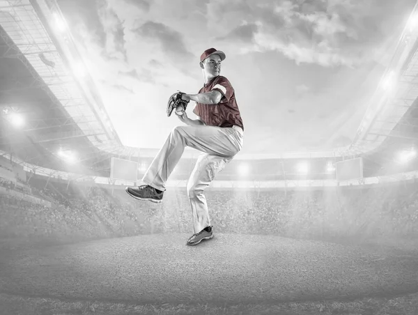 Baseballspieler in Aktion Stockfoto
