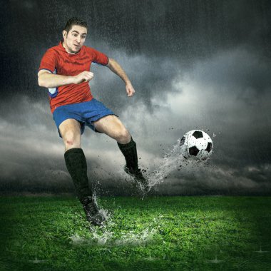 Futbol oyuncu topu ile