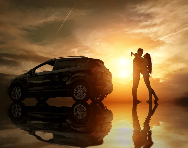 Happy couple near new car — Stock Photo, Image