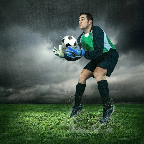 Football goalkeeper with ball — Stock Photo, Image