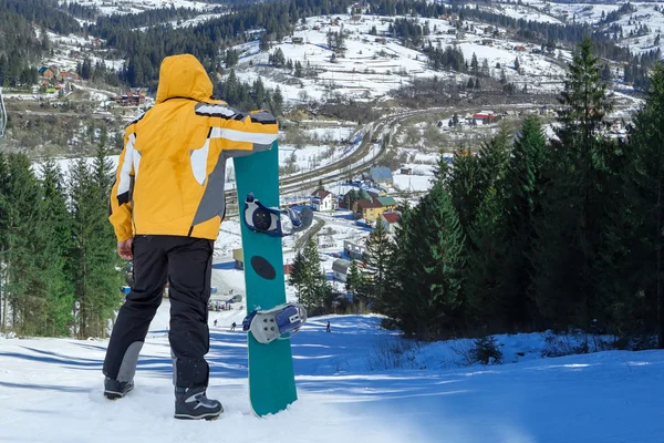 Człowiek z snowboardowe — Zdjęcie stockowe