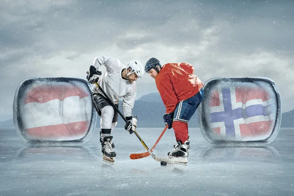 Ishockeyspelare i isen — Stockfoto