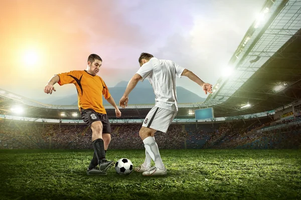 Two football players with ball — Stock Photo, Image