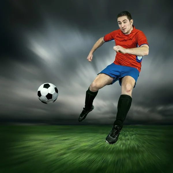 Football player with ball — Stock Photo, Image