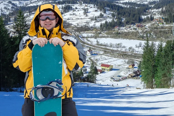 Człowiek w gogle z snowboardowe — Zdjęcie stockowe