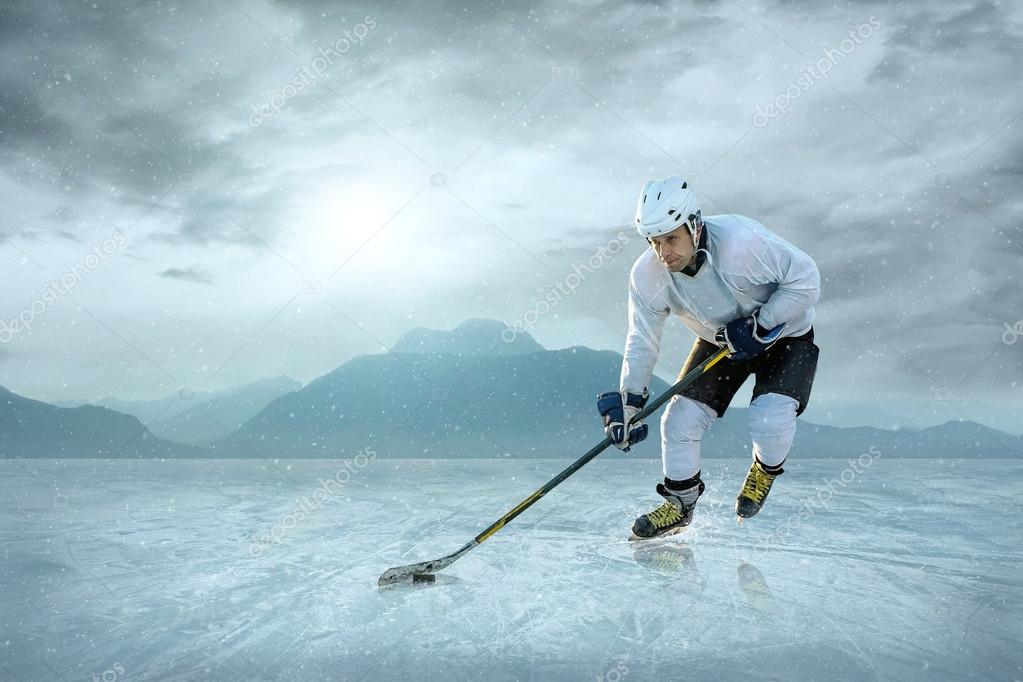 Ice hockey player on ice Stock Photo by ©yuran78 54462833