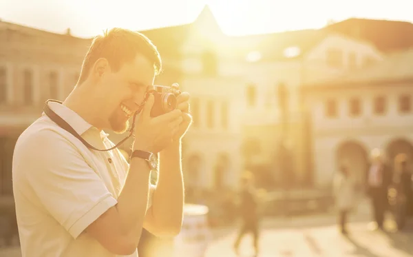 Tourist with photo camera — Stock Photo, Image