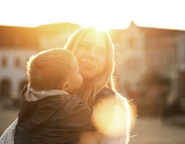 Happy mother and son on  street — Stock Photo, Image